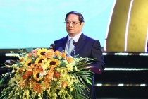 Prime Minister Pham Minh Chinh attended the Conference to honor people with meritorious services to the revolution