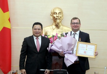 Presenting the Campaign Medal to Head of Representative Office of Hanns Seidel Institute